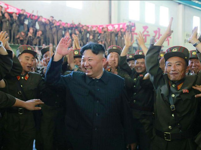 This picture taken on July 4, 2017 and released from North Korea's official Korean Central News Agency (KCNA) on July 5, 2017 shows North Korean leader Kim Jong-Un (C) celebrating the successful test-fire of the intercontinental ballistic missile Hwasong-14 at an undisclosed location. South Korea and the United States fired …