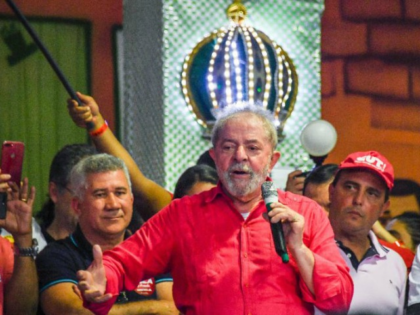 Former Brazilian President, Luiz Inacio Lula da Silva (red shirt) participates in a congre