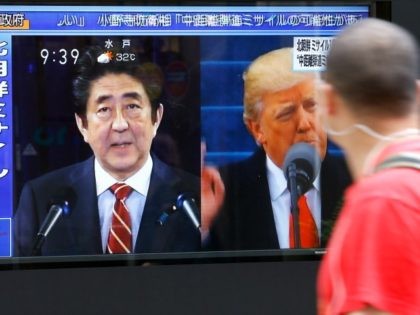 A man looks at a TV news program reporting North Korea's missile launch, in Tokyo, Tuesday, Aug. 29, 2017. North Korea fired a ballistic missile from its capital Pyongyang that flew over Japan before plunging into the northern Pacific Ocean, officials said Tuesday, an aggressive test-flight over the territory of …