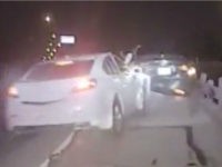 officer-matt--lesell-hit-traffic-stop-screenshot A car slammed into Texas police officer Matt Lesell as he approached a vehicle he pulled over for a routine traffic stop, according to newly released dashcam footage of the incident. He got up a few seconds later.