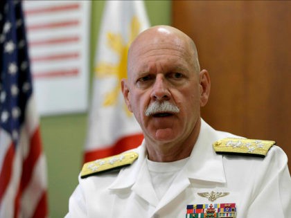 U.S. Pacific Fleet Commander Adm. Scott Swift talks during an interview with journalists F
