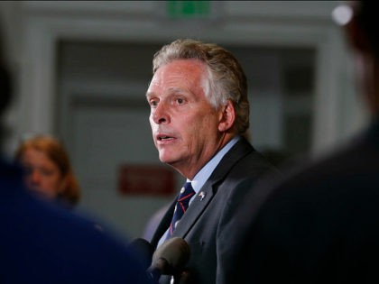 Virginia Gov. Terry McAuliffe addresses a news conference concerning the white nationalist rally and violence in Charlottesville, Va., Saturday, Aug. 12, 2017. (AP Photo/Steve Helber)