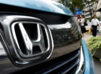 Honda's profits have been boosted by strong motorcycle sales
