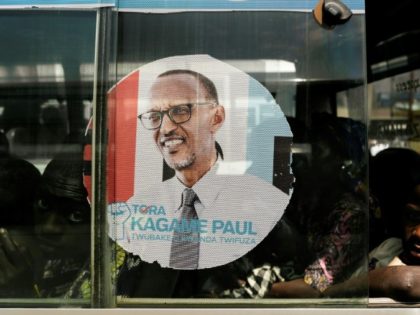 A bus is adorned with an image of incumbent Rwandan President Paul Kagame, expected to win