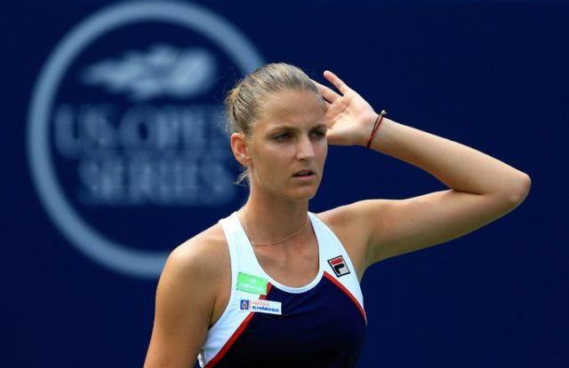 Karolina Pliskova of Czech Republic prepares for a serve from Naomi Osaka of Japan during