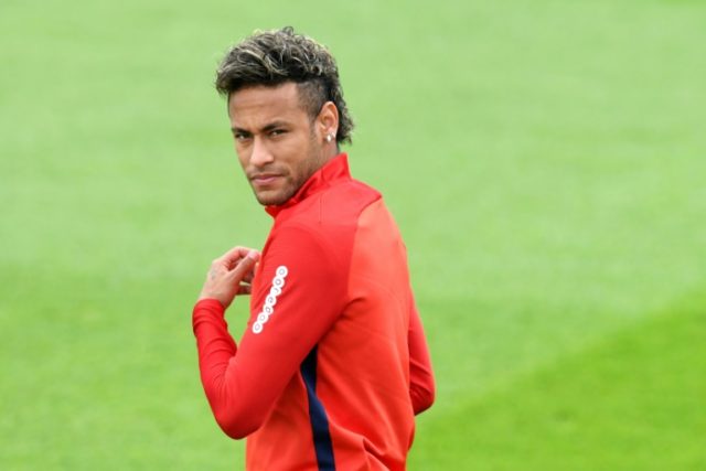 Paris Saint-Germain forward Neymar takes part in a training session on August 11, 2017