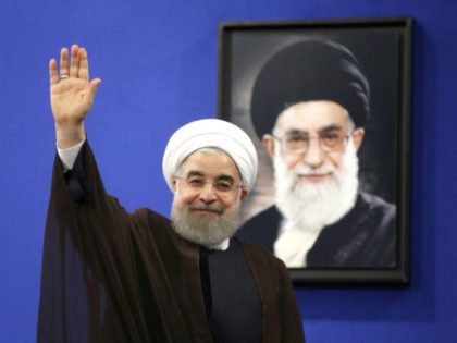 Newly re-elected Iranian President Hassan Rouhani gestures after delivering a televised speech in the capital Tehran on May 20, 2017