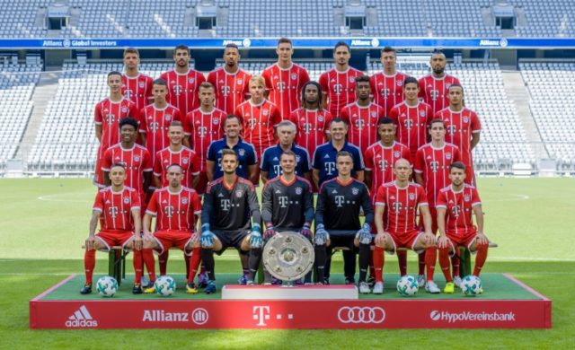 Players and coaches of German first division Bundesliga club Bayern Munich pose for a team