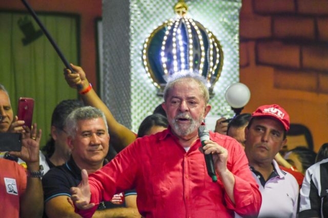 Former Brazilian President, Luiz Inacio Lula da Silva (red shirt) participates in a congre