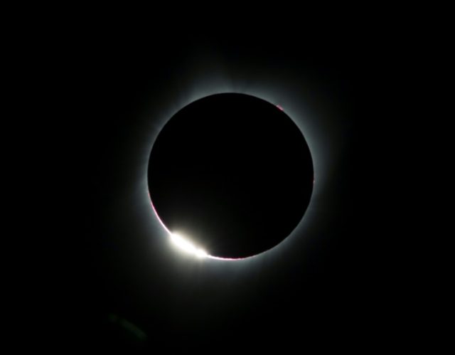 The "diamond ring effect" is seen during a total solar eclipse as seen from the Lowell Obs