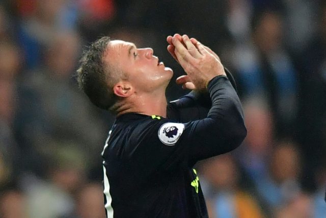 Everton's Wayne Rooney celebrates after scoring against Manchester City during their Premi