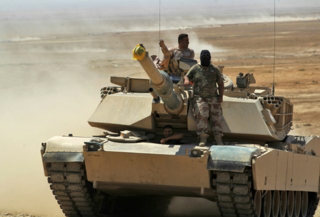 Iraqi forces backed by Shiite paramilitary fighters advance towards Tal Afar, the main rem
