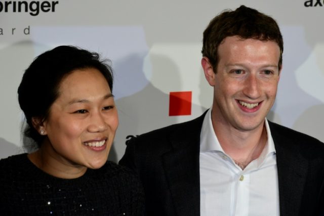 Facebook co-founder and CEO Mark Zuckerberg and his wife Priscilla Chan, shown in this 2016 file photo, said they hope baby August is a good sleeper and takes lots of naps