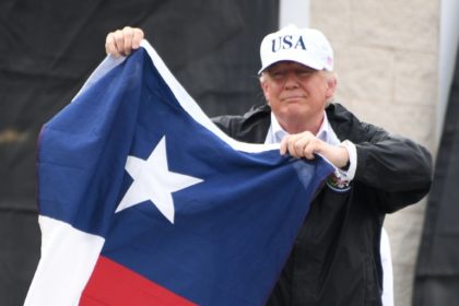 Emerging from a briefing on disaster relief in Corpus Christi, President Donald Trump clim