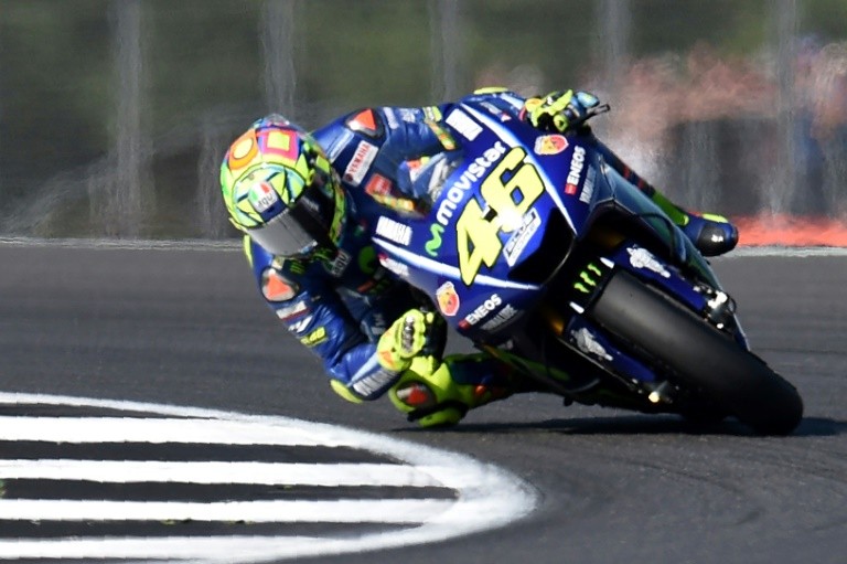 Crash leaves MotoGP legend Rossi with suspected broken leg - Breitbart