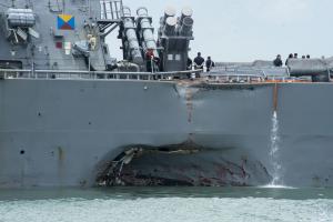 Divers search flooded USS John S. McCain; sailors still missing