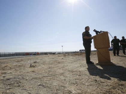 Roy Villarreal, acting Chief Patrol Agent of the Border Patrol, San Diego Sector, speaks during a news conference in front of secondary fencing along the border separating San Diego from Tijuana, Mexico, Tuesday, Sept. 26, 2017, in San Diego. The federal government said Tuesday that contractors began building eight prototypes …