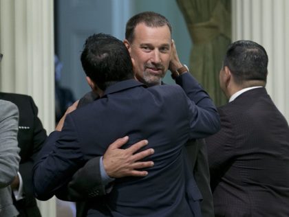 Brian Dahle hugs Anthony Rendon (Rich Pedroncelli / Associated Press)