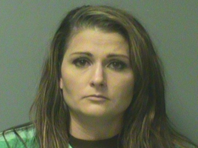 Erin Lee Macke, 30, an Iowa mother, was arrested Thursday, charged with leaving her four y