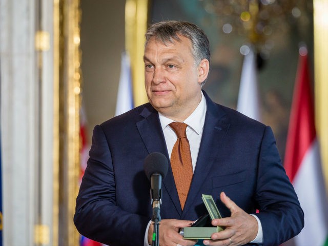 Hungarian Prime Minister Victor Orban speaks at the Royal Castle during a meeting of the V