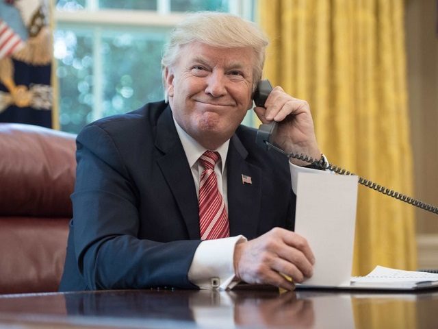 US President Donald Trump waits to speak on the phone with Irish Prime Minister Leo Varadk
