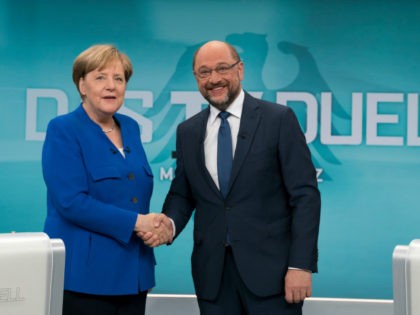 BERLIN, GERMANY - SEPTEMBER 3: In this handout picture provided by German television channel ARD, German Chancellor and Christian Democrat (CDU) Angela Merkel and German Social Democrat (SPD) and chancellor candidate Martin Schulz shake hands prior to a televised debate at ARD television studios on September 3, 2017 in Berlin, …