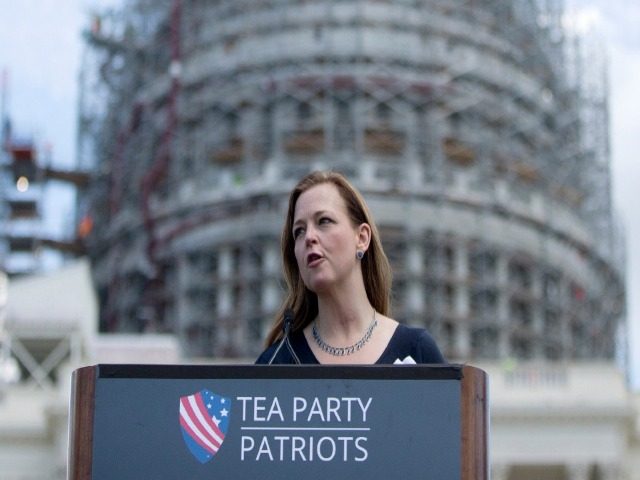 Jenny Beth Martin, president and co-founder of the Tea Party Patriots speaks during a rally organized by Tea Party Patriots on Capitol Hill in Washington, Wednesday, Sept. 9, 2015, to oppose the Iran nuclear agreement. (AP Photo/Carolyn Kaster)
