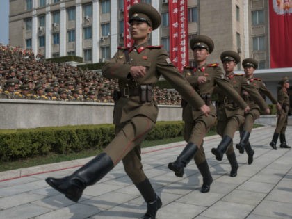 Korean People's Army (KPA) soldiers march to their positions prior to a military parade marking the 105th anniversary of the birth of late North Korean leader Kim Il-Sung, in Pyongyang on April 15, 2017. / AFP PHOTO / ED JONES (Photo credit should read ED JONES/AFP/Getty Images)
