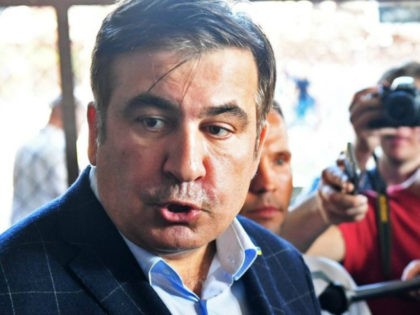 Former Georgian President and Ukrainian Gov. Mikheil Saakashvili, exiled from Ukraine when current President Petro Poroshenko revoked his citizenship, reentered the country on Sunday after a crowd of supporters pushed back border agents keeping him away