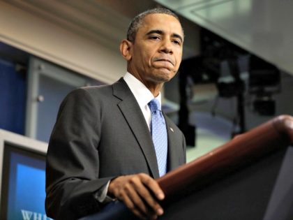 Obama at Podium AFP