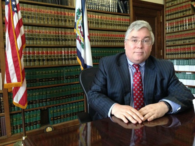 West Virginia Attorney General Patrick Morrisey is shown Thursday, March 3, 2016, outside the state Capitol in Charleston, W.Va. Morrisey's coal-dependent state is helping lead a lawsuit against President Barack Obama's new clean-power rules. In February the U.S. Supreme Court issued a stay of the rules until legal challenges are resolved. (AP Photo/John Raby)