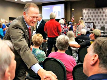 Roy Moore shakes hands