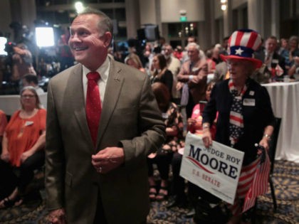 Alabama GOP Senate nominee Roy Moore greets supporters at his victory party on Tuesday nig