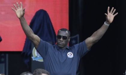 Former NFL football player Shannon Sharpe is introduced during the induction ceremony at the Pro Football Hall of Fame Saturday, Aug. 3, 2013, in Canton, Ohio. (AP Photo/Tony Dejak) ORG XMIT: OHTD10x