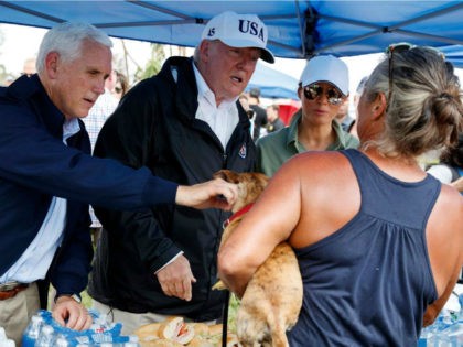 From left, Vice President Mike Pence, President Trump and First Lady Melania Trump greet Florida residents impacted by Hurricane Irma in Naples on Thursday, Sept. 14, 2017.