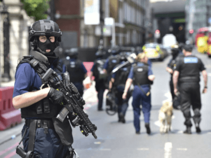 Armed police on St Thomas Street, London, Sunday June 4, 2017, near the scene of Saturday night's terrorist incident on London Bridge and at Borough Market. Several people were killed in the terror attack at the heart of London and dozens injured. Prime Minister Theresa May convened an emergency security …