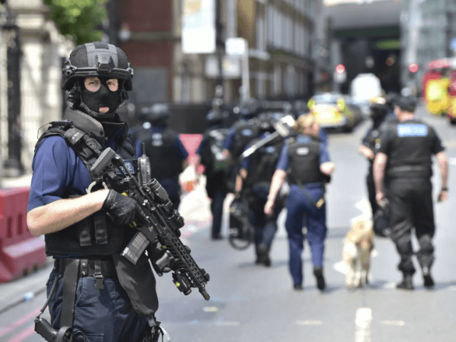 Armed police on St Thomas Street, London, Sunday June 4, 2017, near the scene of Saturday night's terrorist incident on London Bridge and at Borough Market. Several people were killed in the terror attack at the heart of London and dozens injured. Prime Minister Theresa May convened an emergency security …