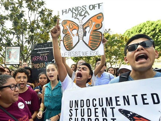 Young immigrants and supporters gather for a rally in support of Deferred Action for Child