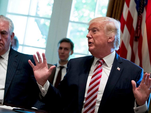 Secretary of State Rex Tillerson, left, and White House Senior Adviser Jared Kushner liste