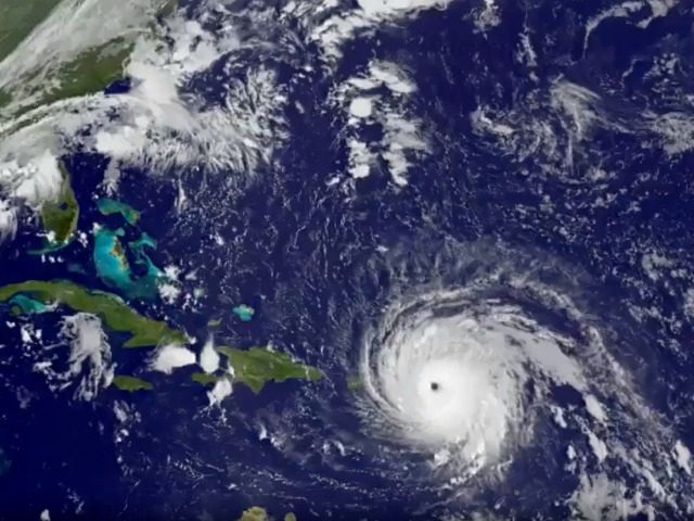 In this GOES-13 satellite image taken Wednesday, Sept. 6, 2017 at 7:15 a.m. EDT, and released by NASA/NOAA GOES Project, Hurricane Irma tracks over Saint Martin and the Leeward Islands. Hurricane Irma roared into the Caribbean with record force early Wednesday, its 185-mph winds shaking homes and flooding buildings on â¦