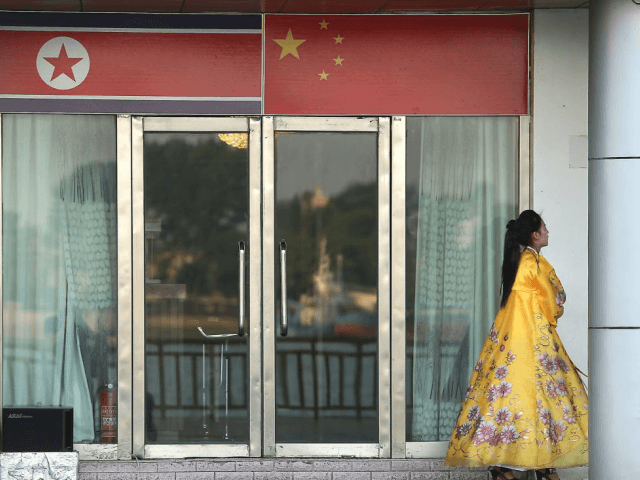 China orders shutdown of North Korea entities, joint ventures