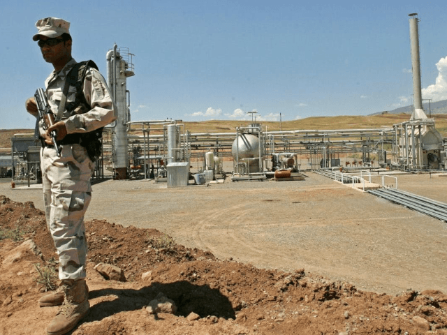 DOHUK, IRAQ, MAY 31: An Iraqi Kurdish soldier stands guard at the Tawke oil field near the town of Zacho on May 31, 2009 in Dohuk province about 250 miles north of Baghdad, Iraq. The Iraqi autonomous region of Kurdistan began crude oil exports on June 1, 2009 for the …