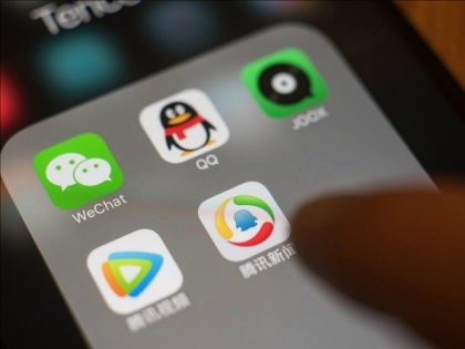 The icons for Tencent Holdings Ltd. applications WeChat, clockwise from top left, QQ, JOOX