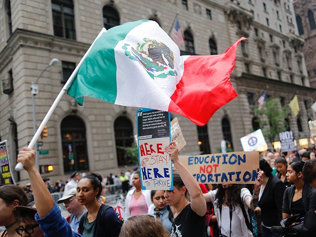 Protesters gather near Trump Tower to protest against attacks on immigrants under policies of US President Donald Trump, August 15, 2017 in New York. / AFP PHOTO / Eduardo MUNOZ ALVAREZ (Photo credit should read EDUARDO MUNOZ ALVAREZ/AFP/Getty Images)