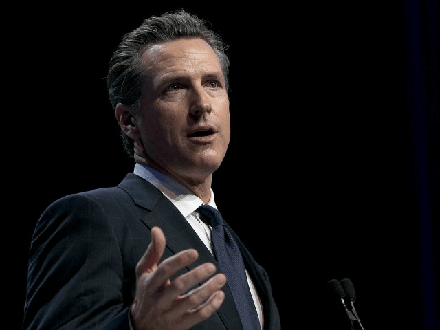 Gubernatorial candidate Gavin Newsom called on the National Rifle Assn. to take down a controversial new video that he argued villanizes political rivals and could lead to violence.