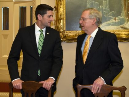 House Speaker Paul Ryan of Wis., left, talks with Senate Majority Leader Mitch McConnell o