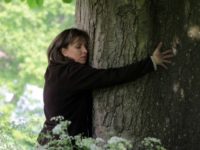 tree-hugging-getty Matt Cardy/Getty Images