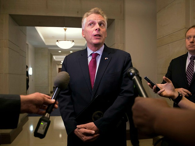 Virginia Gov. Terry McAuliffe speaks with reporters at the U.S. Capitol in Washington afte