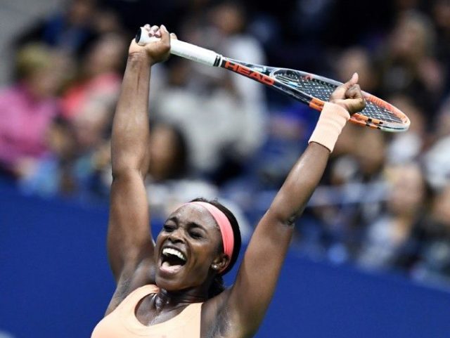 Sloane Stephens of the US celebrates after defeating compatriot Venus Williams in their 20