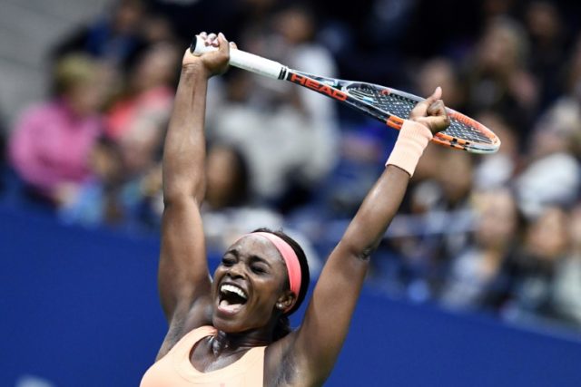 Sloane Stephens of the US celebrates after defeating compatriot Venus Williams in their 20